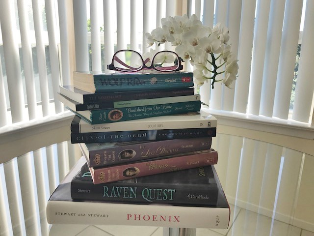 Sharon Stewart books with glasses and orchid